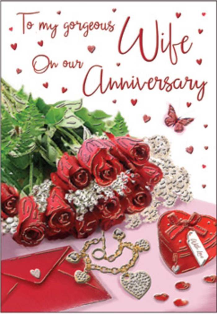 A richly detailed anniversary card scene is arranged with the precision of an expert florist working in a quiet Marylebone studio, where every element supports a story of lasting love. At the centre, a bouquet of classic red roses commands attention, each flower fully rounded, with layered petals that form deep, shadowed spirals. They are wrapped or gathered in a way that feels both elegant and inviting, their deep red tones intensified by the lush green foliage surrounding them. The leaves catch the light with a soft sheen, suggesting freshness, as if the bouquet has just been prepared for same-day delivery to a nearby Marylebone apartment. Around this floral heart, delicate details build the narrative: a piece of jewellery laid out like a precious memory, a vivid red box hinting at a surprise gift, and subtle heart motifs woven into the design. Some hearts appear printed, others raised or sparkling, creating texture you can almost feel with your fingertips. Nearby, an envelope rests in quiet readiness, its pale surface offering a calm contrast to the passionate reds, as though waiting to carry a message of gratitude, commitment, or renewed vows. Text in a scripted style curves gracefully across the card, echoing the flowing forms of petals and ribbon. The lighting is warm but gentle, more like natural daylight filtering through a Marylebone café window than harsh studio lamps, allowing soft highlights on the roses, the metallic gleam of the jewellery, and the satiny finish of the box to emerge slowly. The overall atmosphere is unapologetically romantic-velvet, gold, and silk textures blending to evoke evenings spent together, anniversaries remembered, and promises quietly kept.